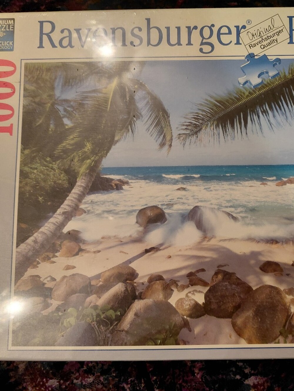Ravensburger Beach Scene Puzzle with Blue Ocean and Green Palms